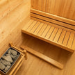 AuroraTherm cedar indoor sauna with wooden benches and glass door.