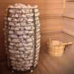 Heliosa TitanGuard sauna heater with stainless steel exterior and control panel.